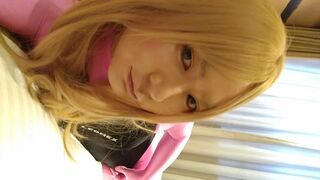 A blonde cross-dressing fiance masturbated perverted over pink full-body tights wearing a swimsuit and gloves.