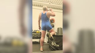 Blue singlet work out at the gym