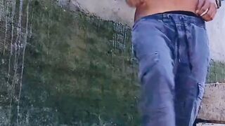 Femboy Piss and Flash Her Sexy Feminized Body Outdoor Piss While in Chastity Cage and Rub Her Small Flaccid Dick